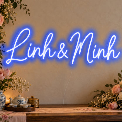 Personalised Vietnamese Couple Names Neon Sign in blue LED neon on clear acrylic, angled view