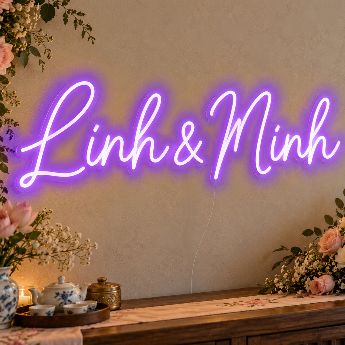 Personalised Vietnamese Couple Names Neon Sign in purple LED neon on clear acrylic, angled view