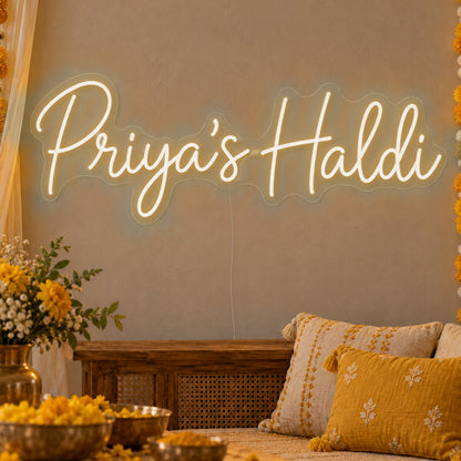 Personalised Haldi Neon Sign in warm white LED neon on clear acrylic, angled view