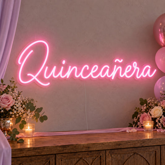 Quinceañera Neon Sign on clear cut-to-shape acrylic, illuminated on a wall in a styled celebration setting