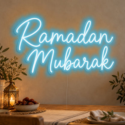 Ramadan Mubarak Neon Sign in ice blue LED neon on clear acrylic, angled view