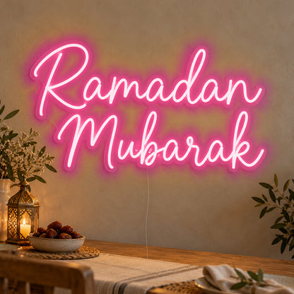 Ramadan Mubarak Neon Sign in rose red LED neon on clear acrylic, angled view
