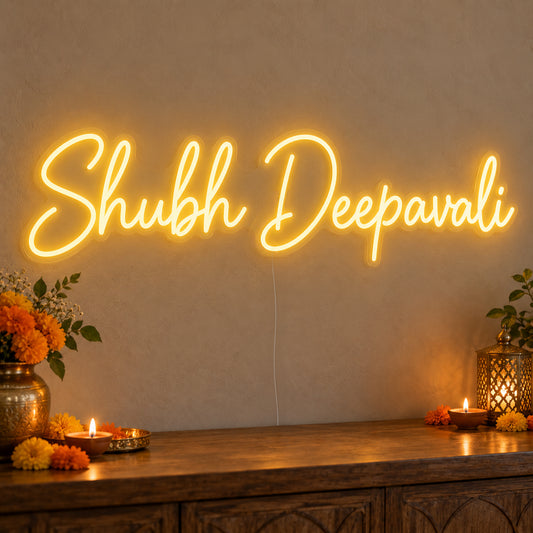 Shubh Deepavali Neon Sign on clear cut-to-shape acrylic, illuminated on a wall in a styled celebration setting