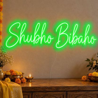 Shubho Bibaho Neon Sign in green LED neon on clear acrylic, angled view