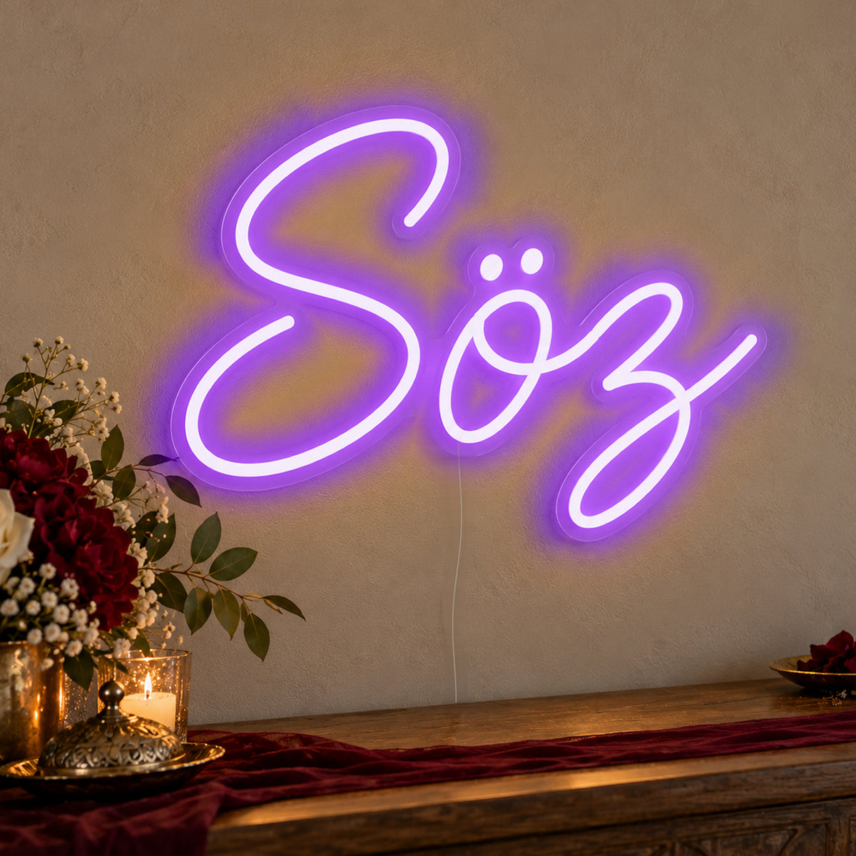 Söz Neon Sign in purple LED neon on clear acrylic, angled view