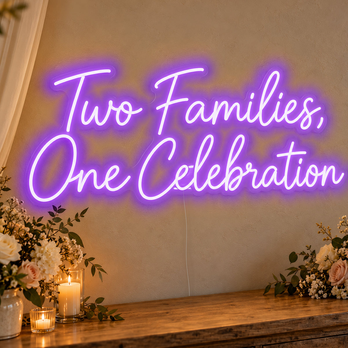 Two Families One Celebration Neon Sign in purple LED neon on clear acrylic, angled view