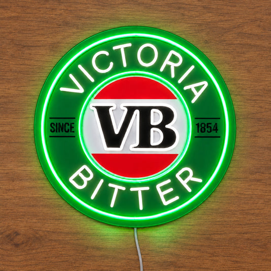 Victoria Bitter neon sign glowing on a wooden surface